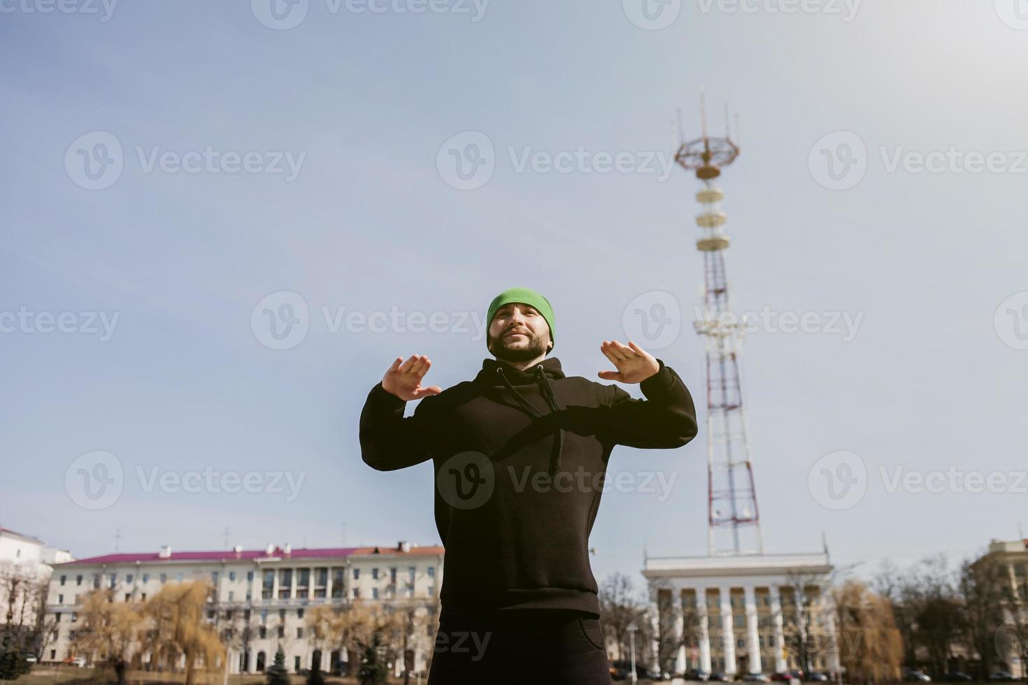 fitness man make stretching exercises photo