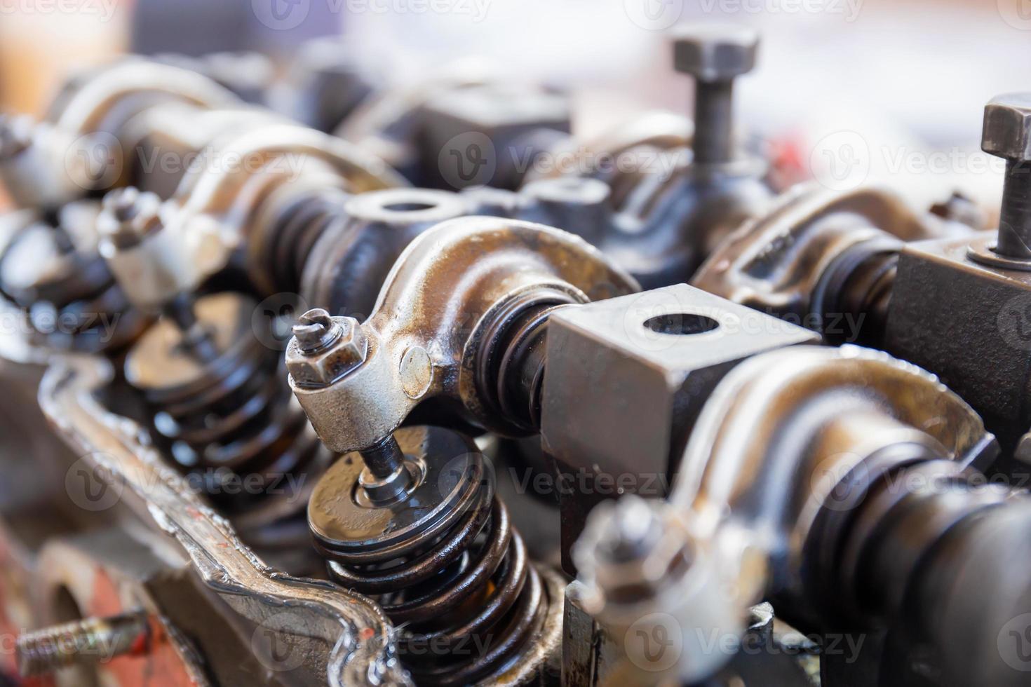 Car engine block camshaft and spring rocker arm valve, repairing and maintenance service concepts photo
