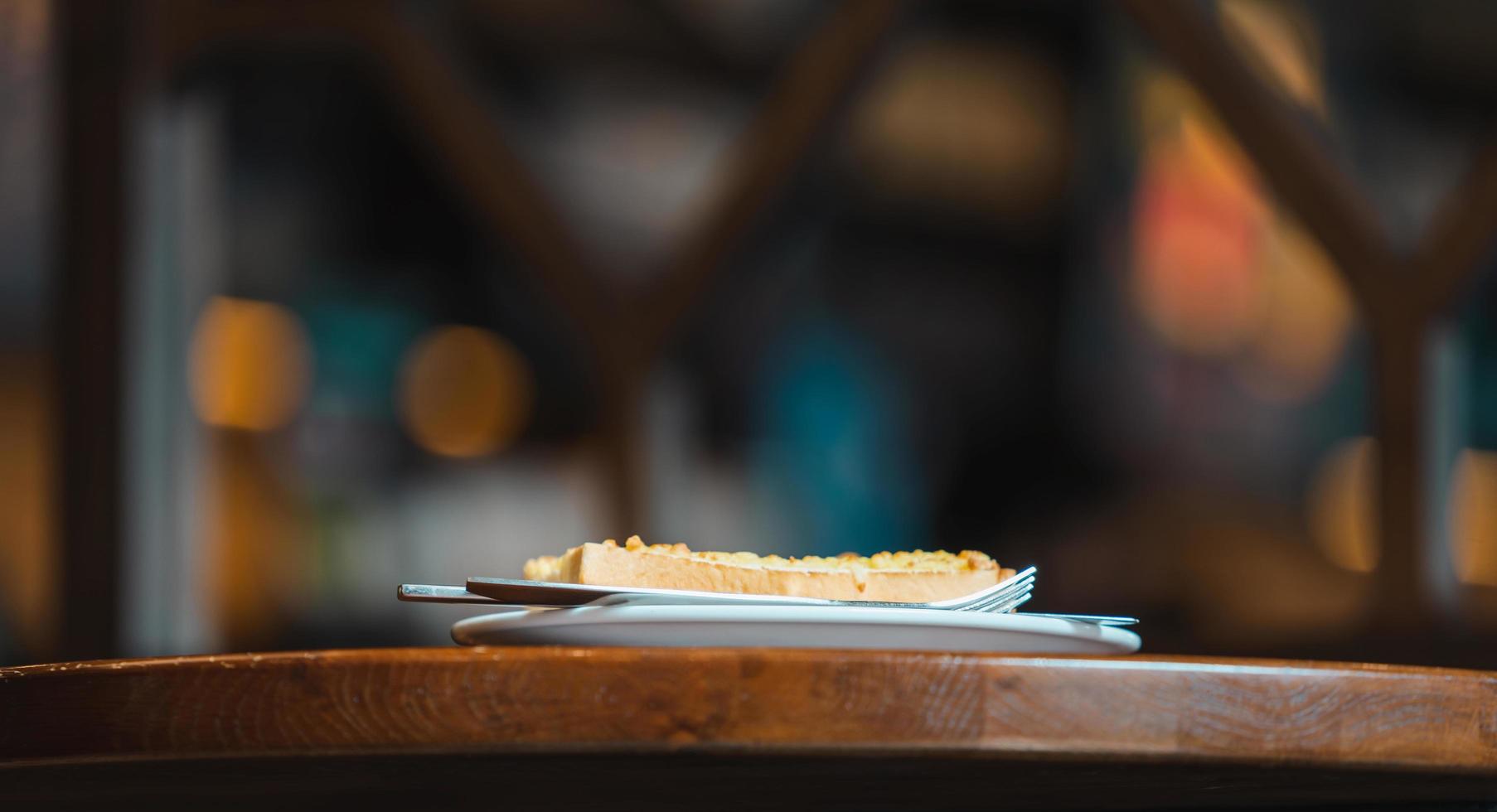 Grilled Sandwich on wood table with bokeh photo