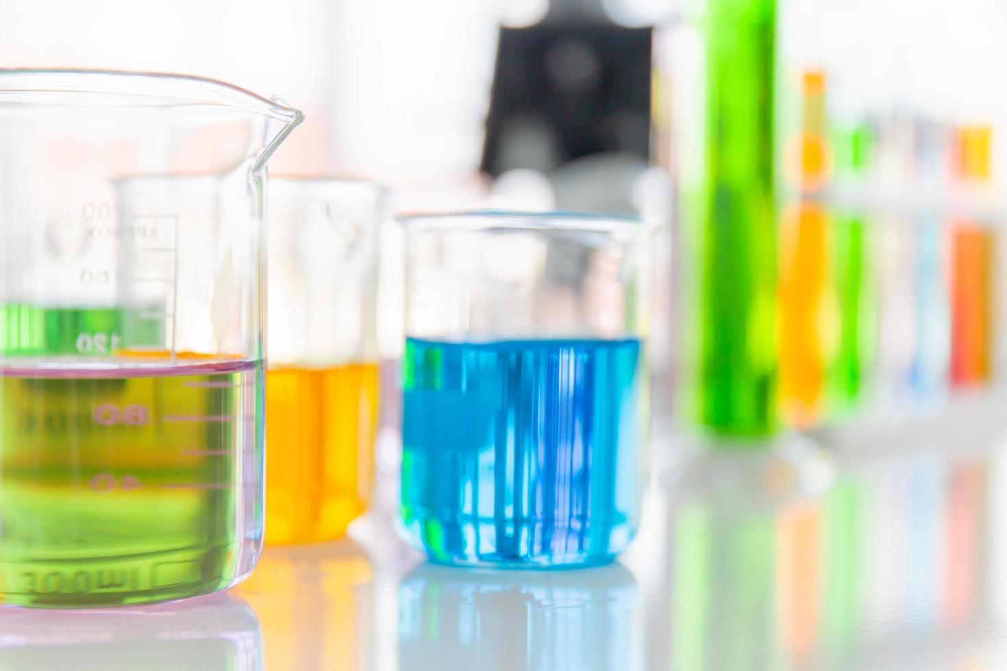 Chemical reagent bottles in scientific experiments of various sizes photo