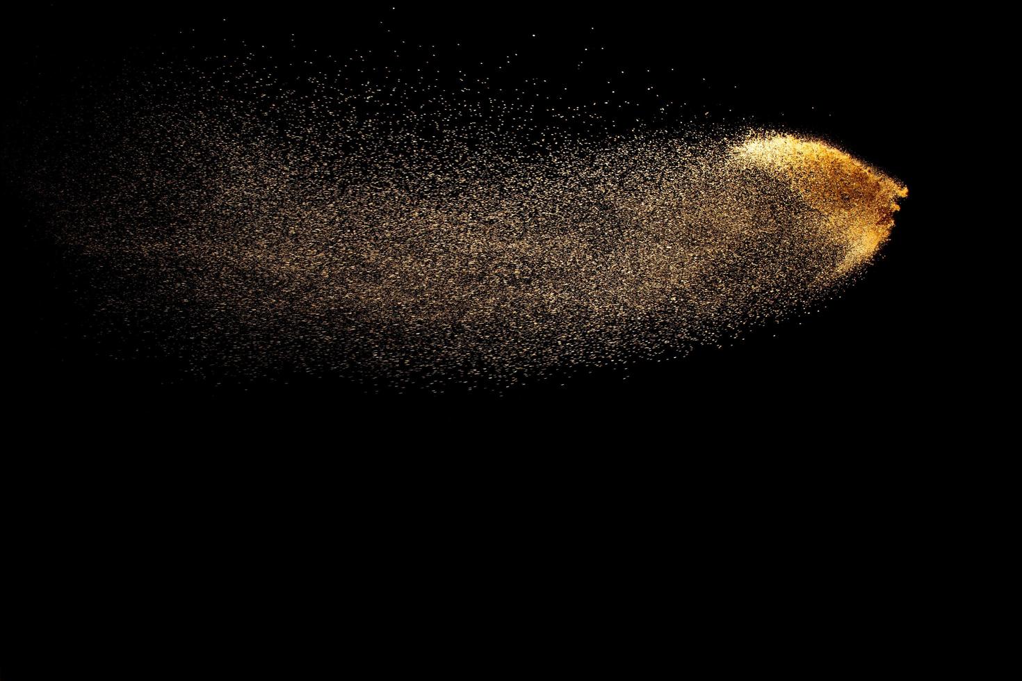 Abstract cloud motion blurred sand background.Sandy explosion isolated on over dark background. photo