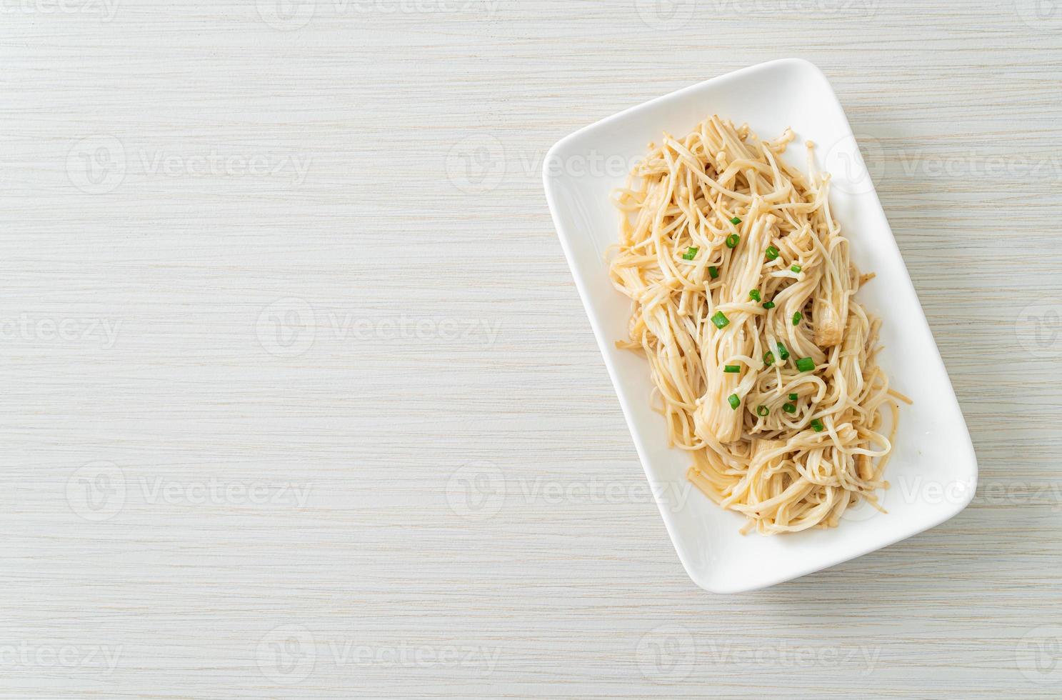 stir-fried golden needle mushroom with butter photo