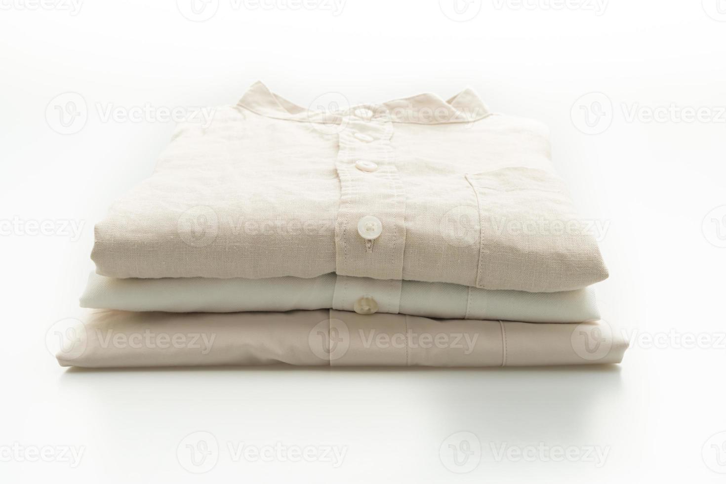 beige shirt fold on white background photo