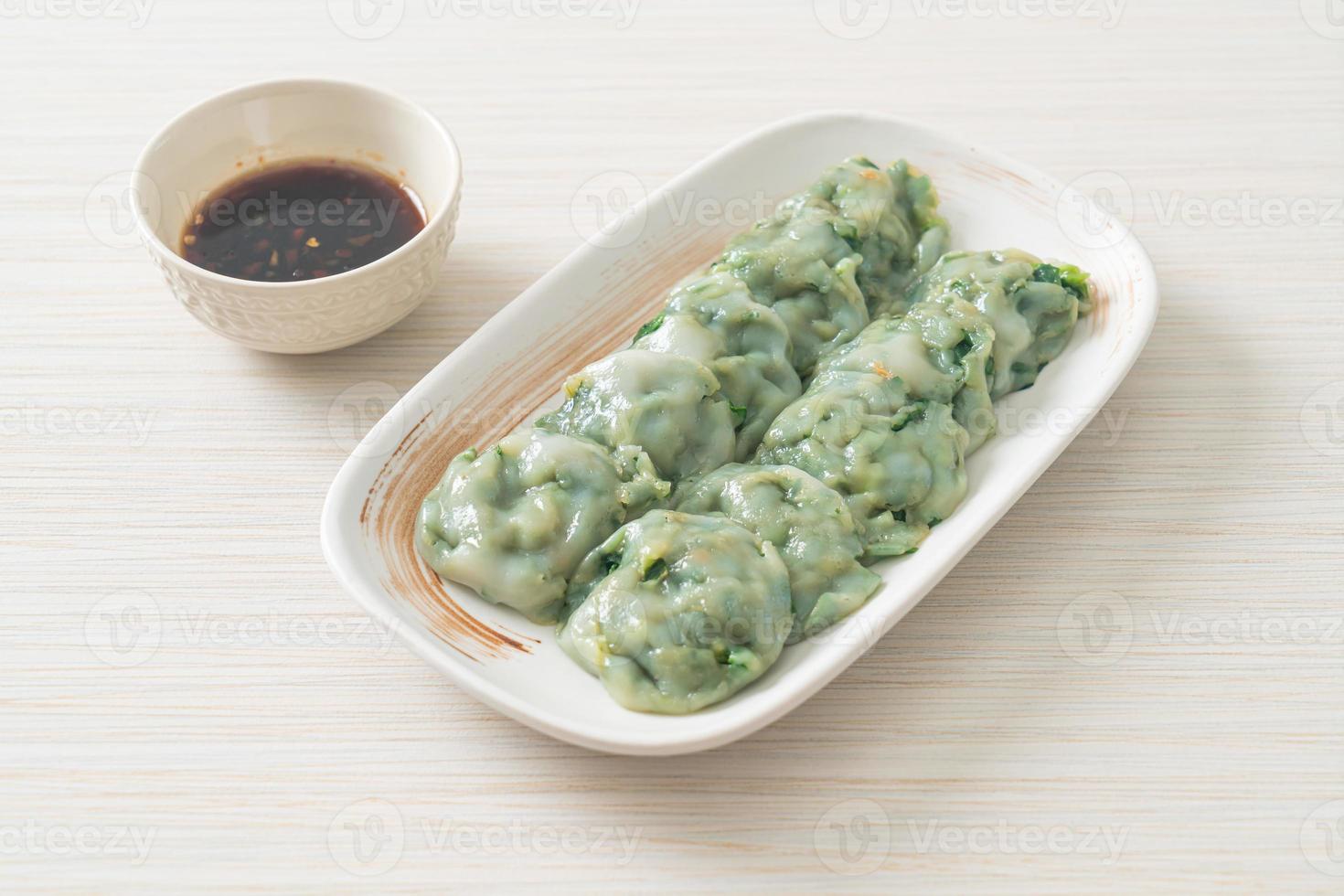 steamed chives dumplings with sauce photo