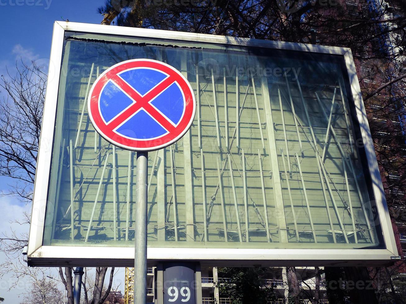 Red and blue regulation sign in the street. photo