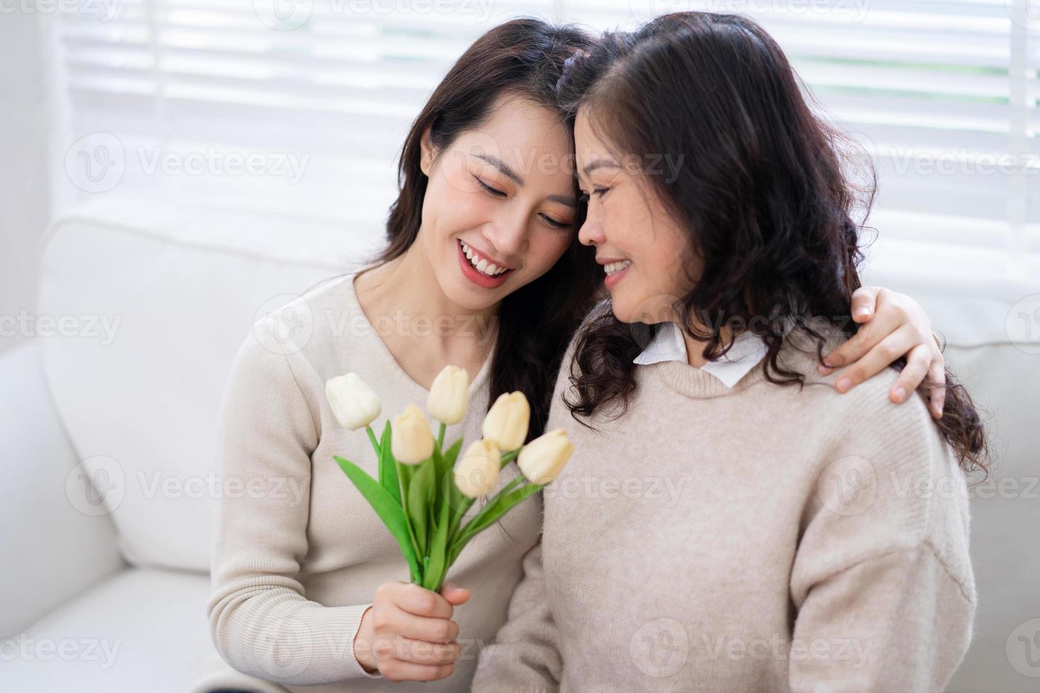 Image of Asian mother and daughter at home photo