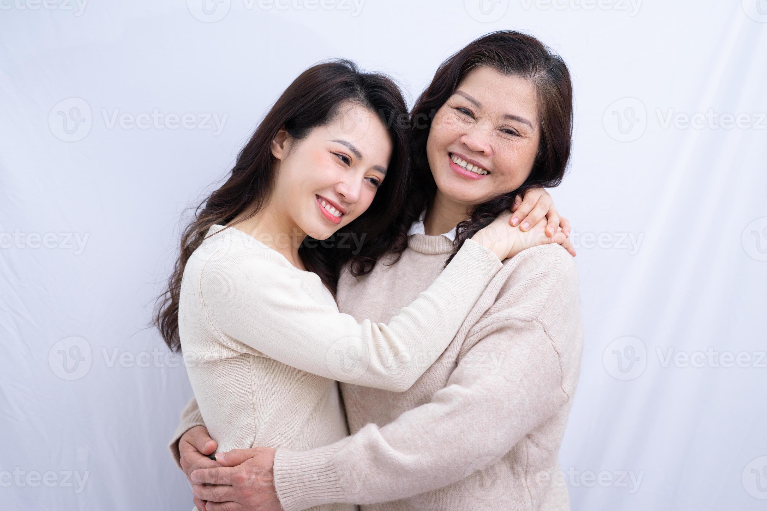 mother and daughter Portrait of Asian mother and daughter on white background 6855414 Stock  Photo at Vecteezy