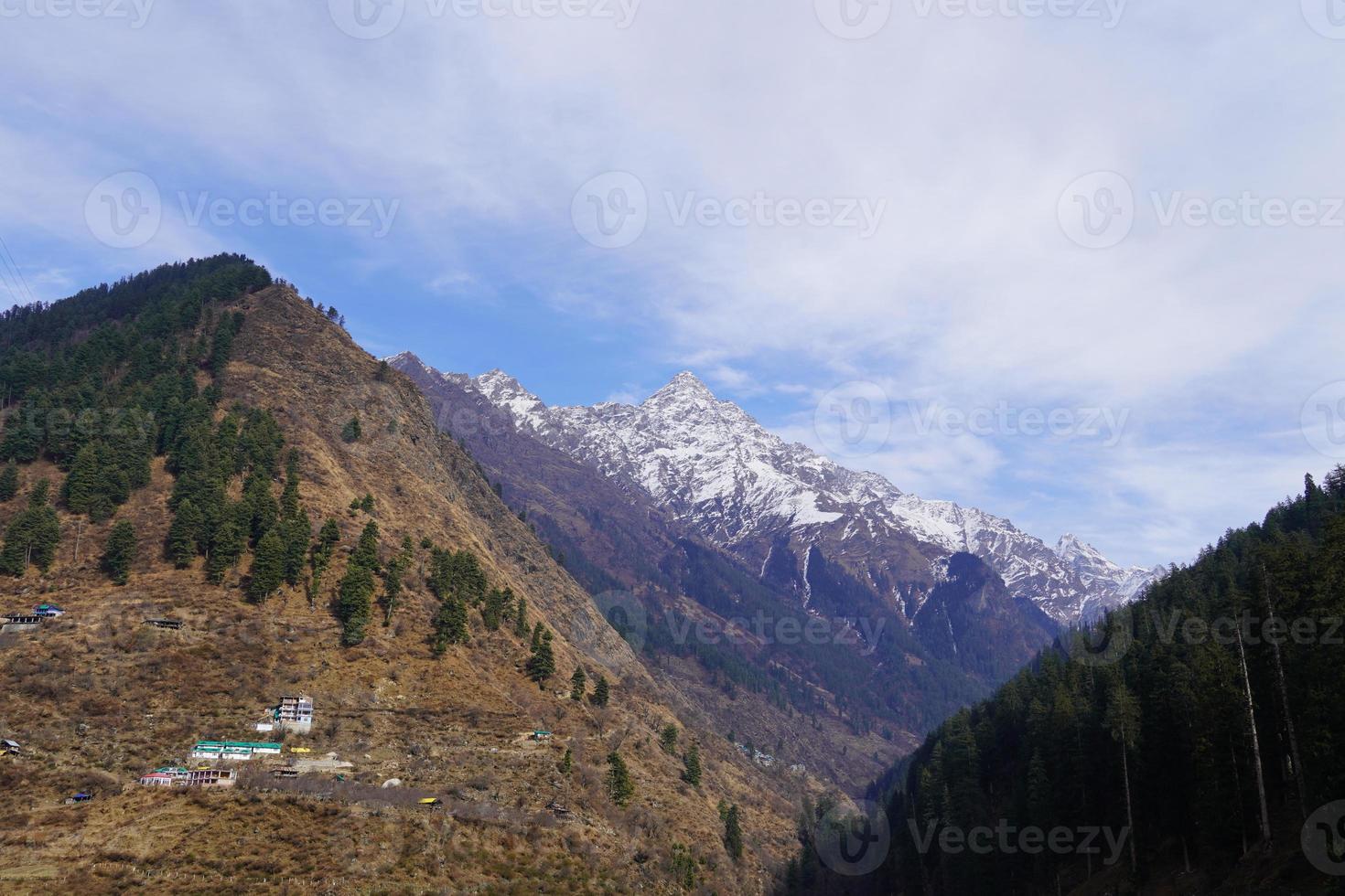 Close view of mountain with clouds photo