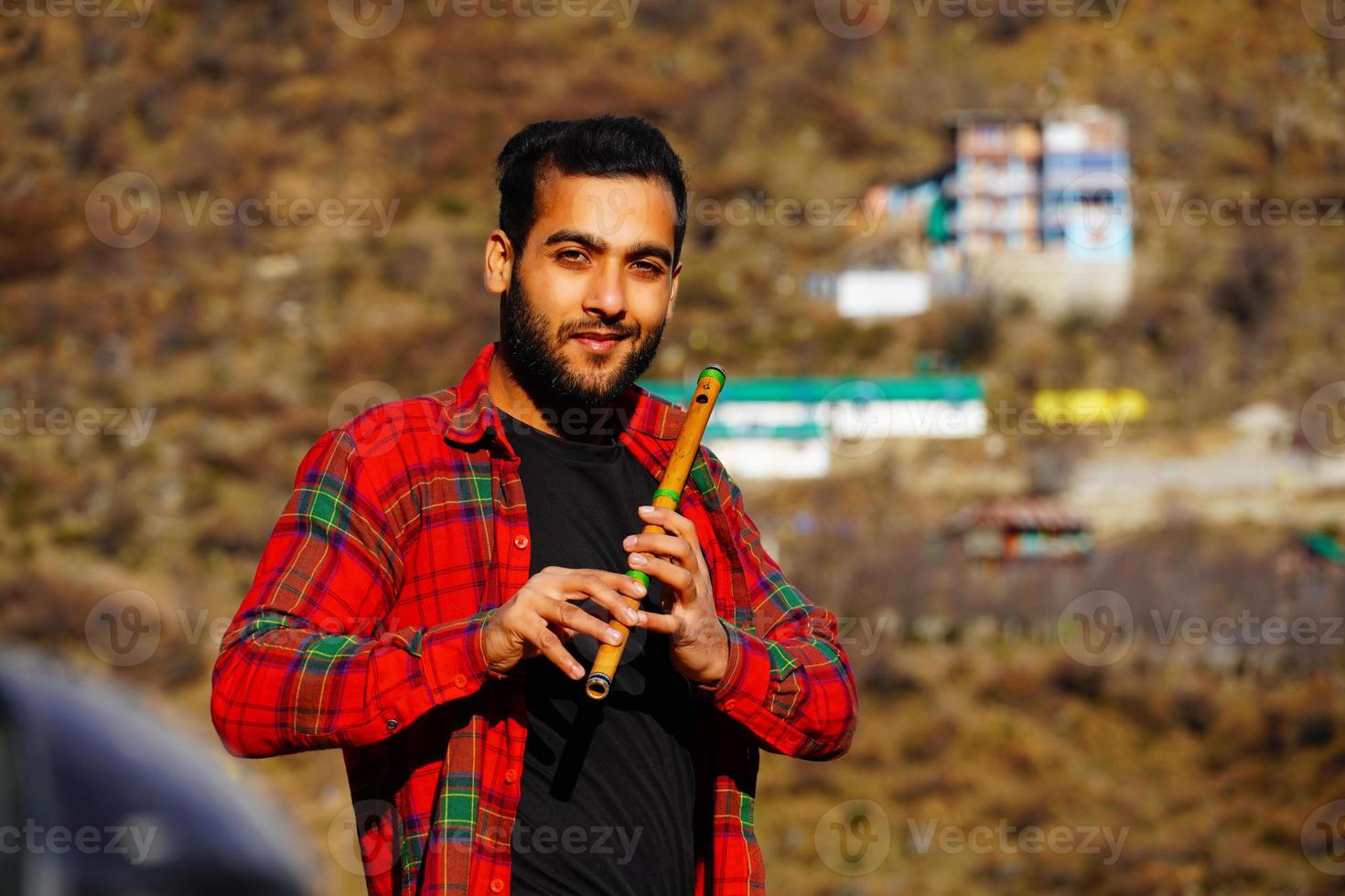 man with flute Close view image photo