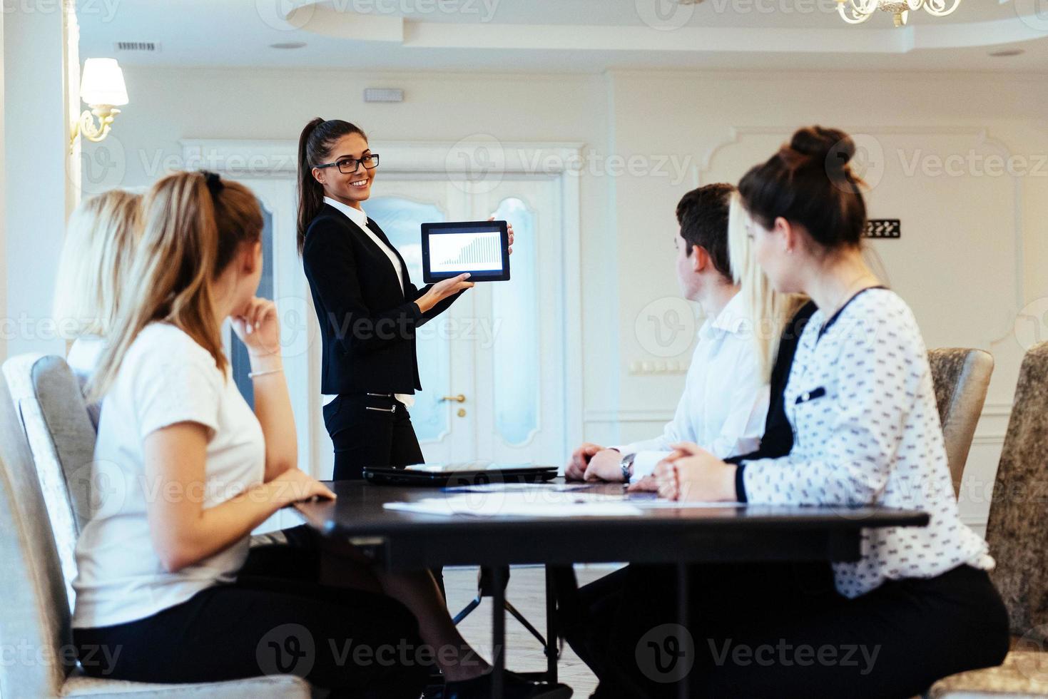 Group of students studying using a laptop photo
