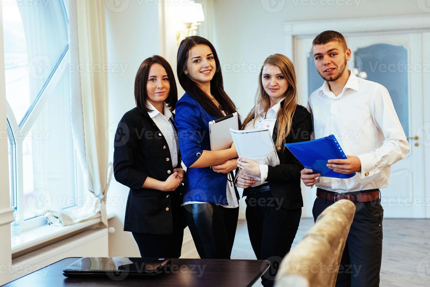 group of students looking happy and smiling photo