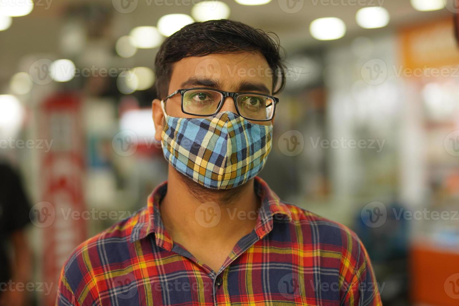 a man in wearing mask due to Covid photo