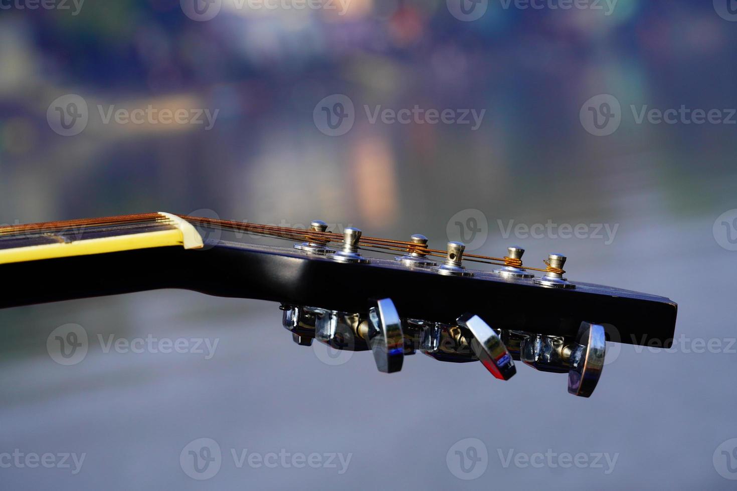 Closeup of an acoustic guitar image photo