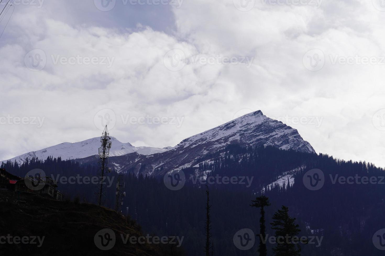 Close view of mountain with clouds photo