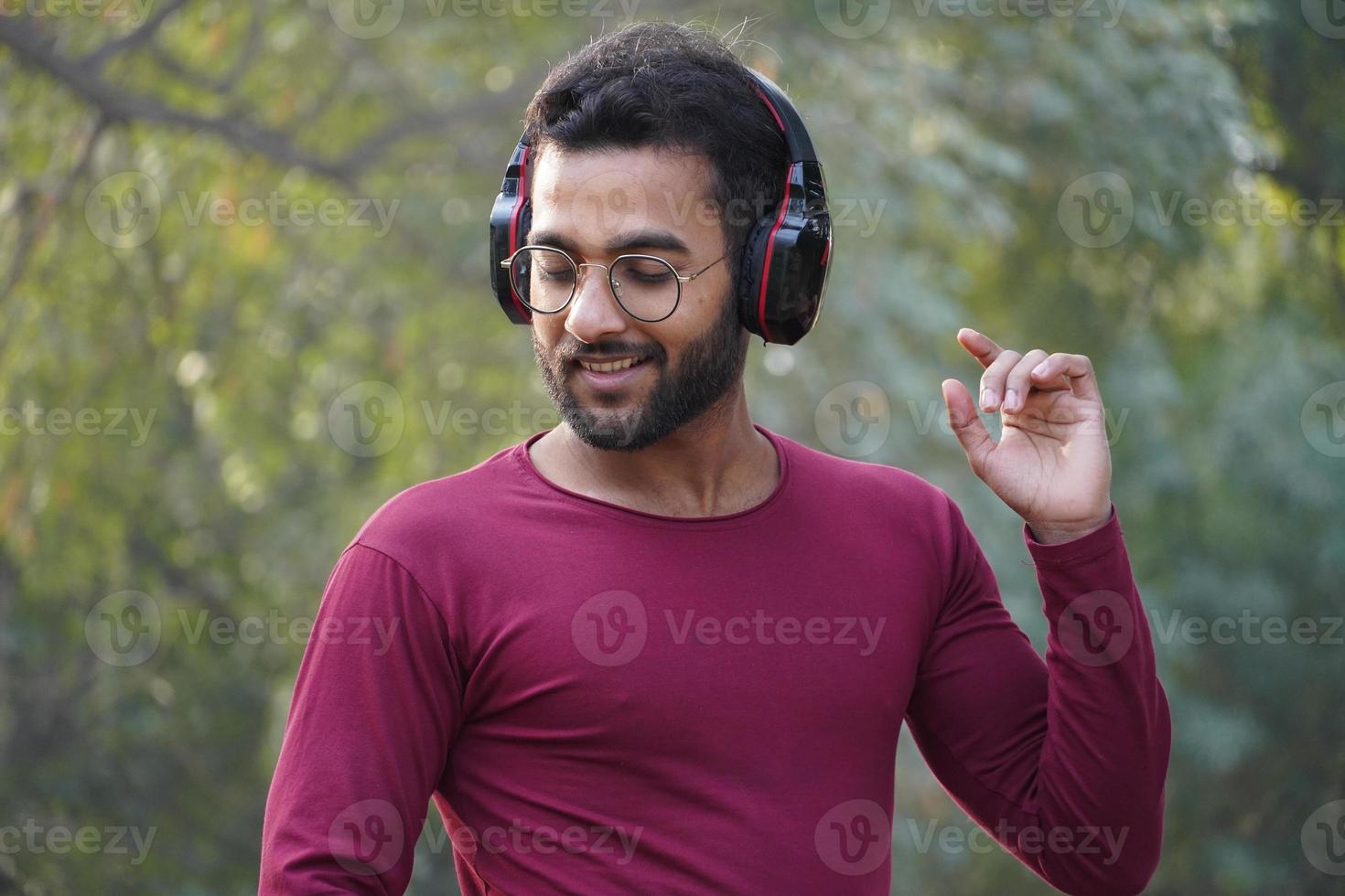 A man listening to the music photo