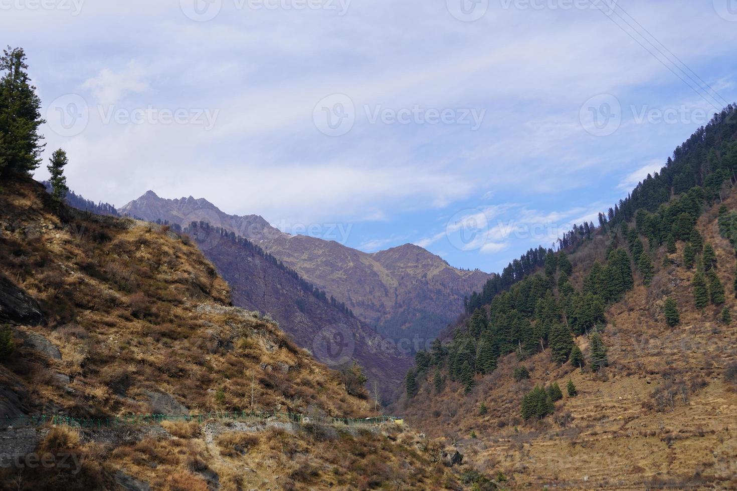 Close view of mountain with clouds photo