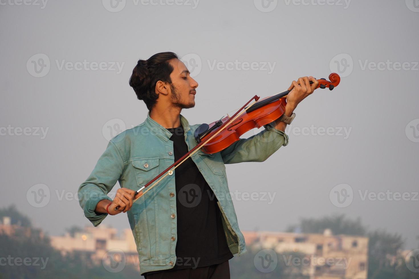 musician playing violin. Music and musical tone concept. images of man musician photo