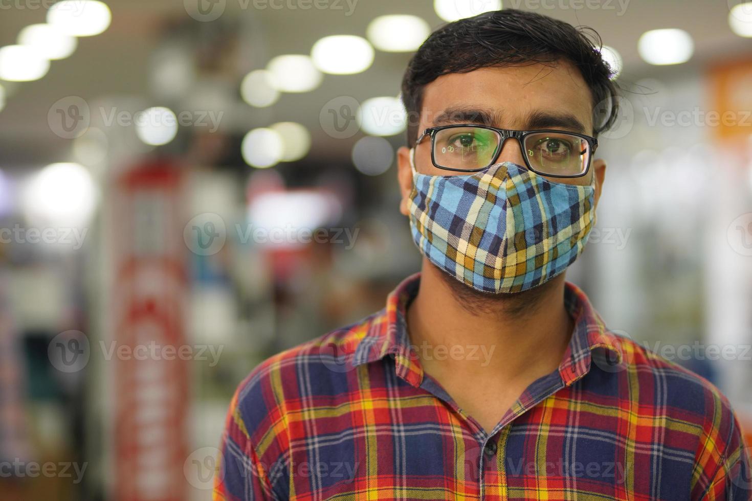 a man in wearing mask due to Covid photo