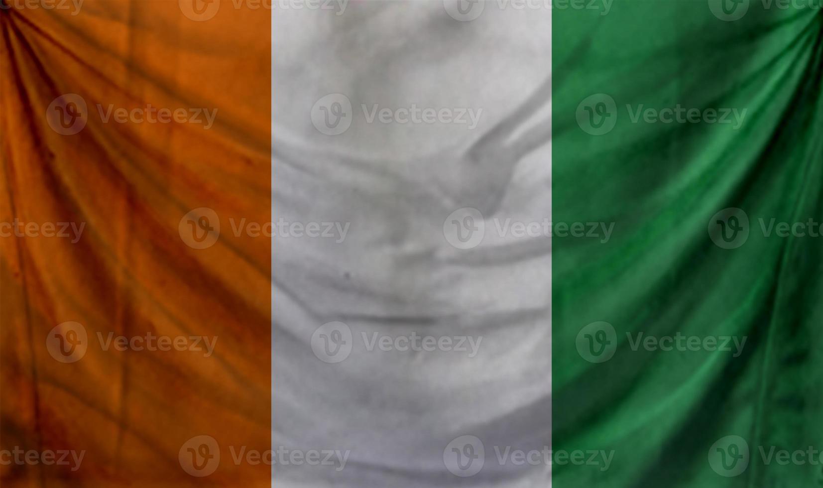 Cote d Ivoire flag waving. Background for patriotic and national design photo