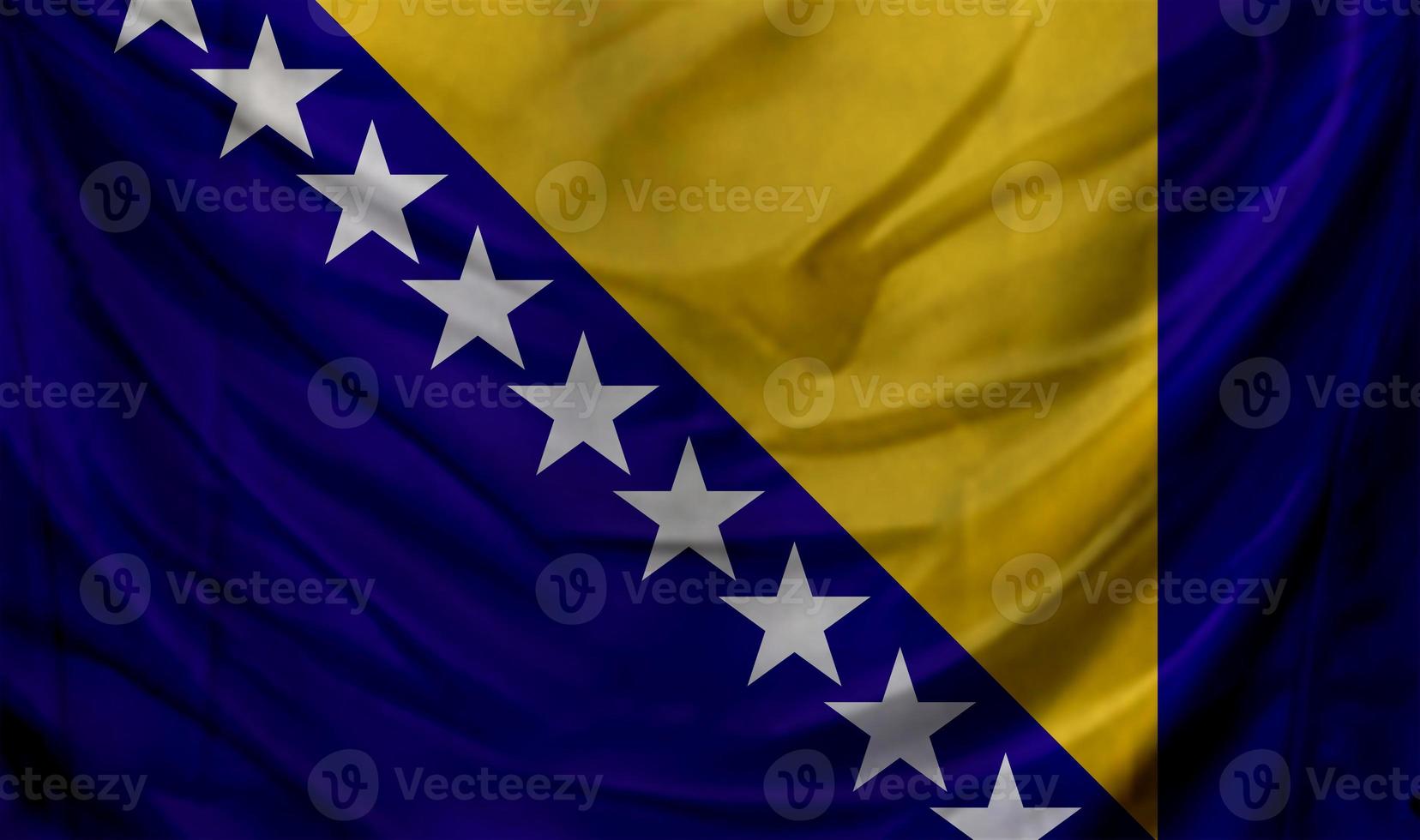 Bosnia and Herzegovina flag waving. Background for patriotic and national design photo