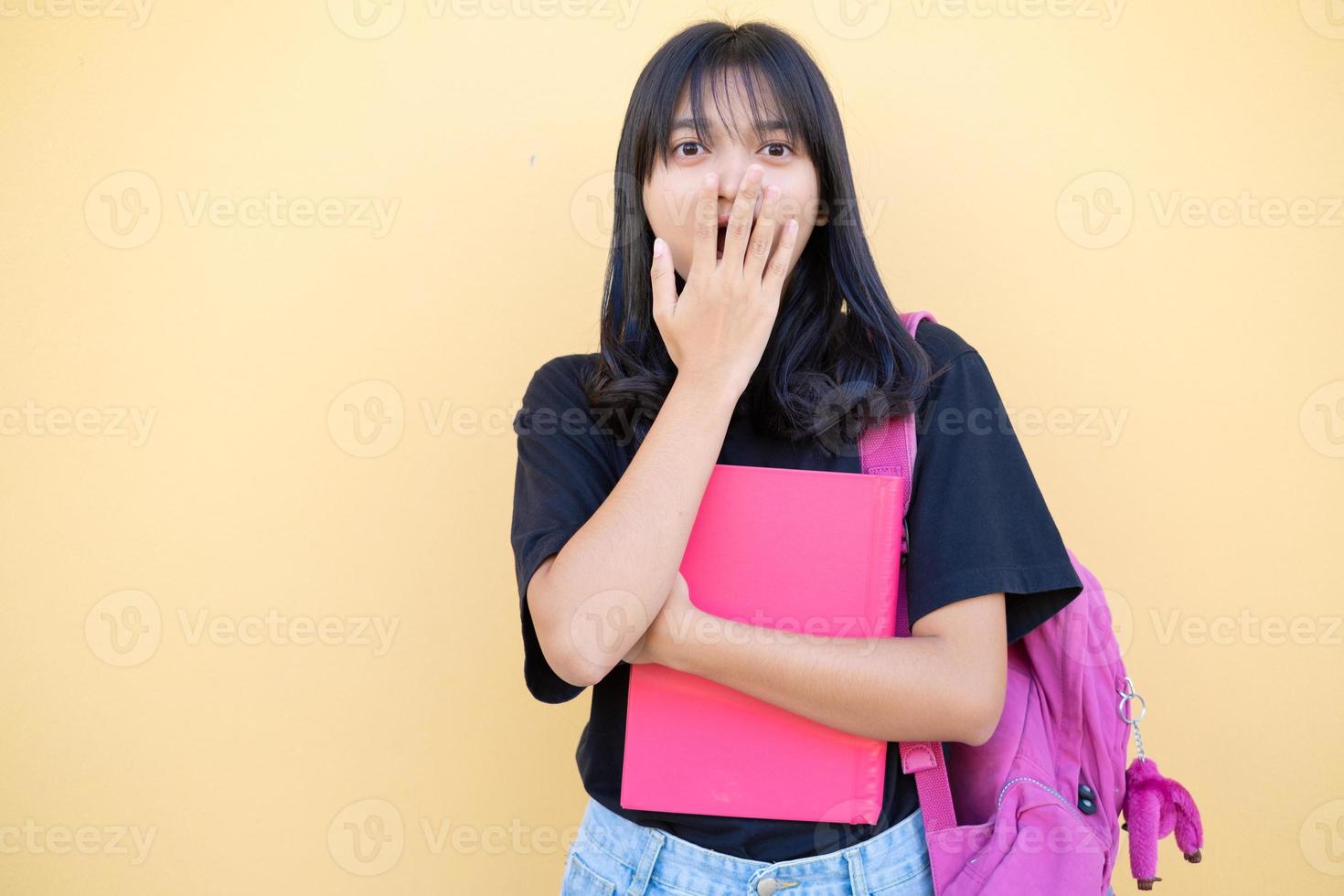 POrtrait young girl on brown background,Back to school. photo