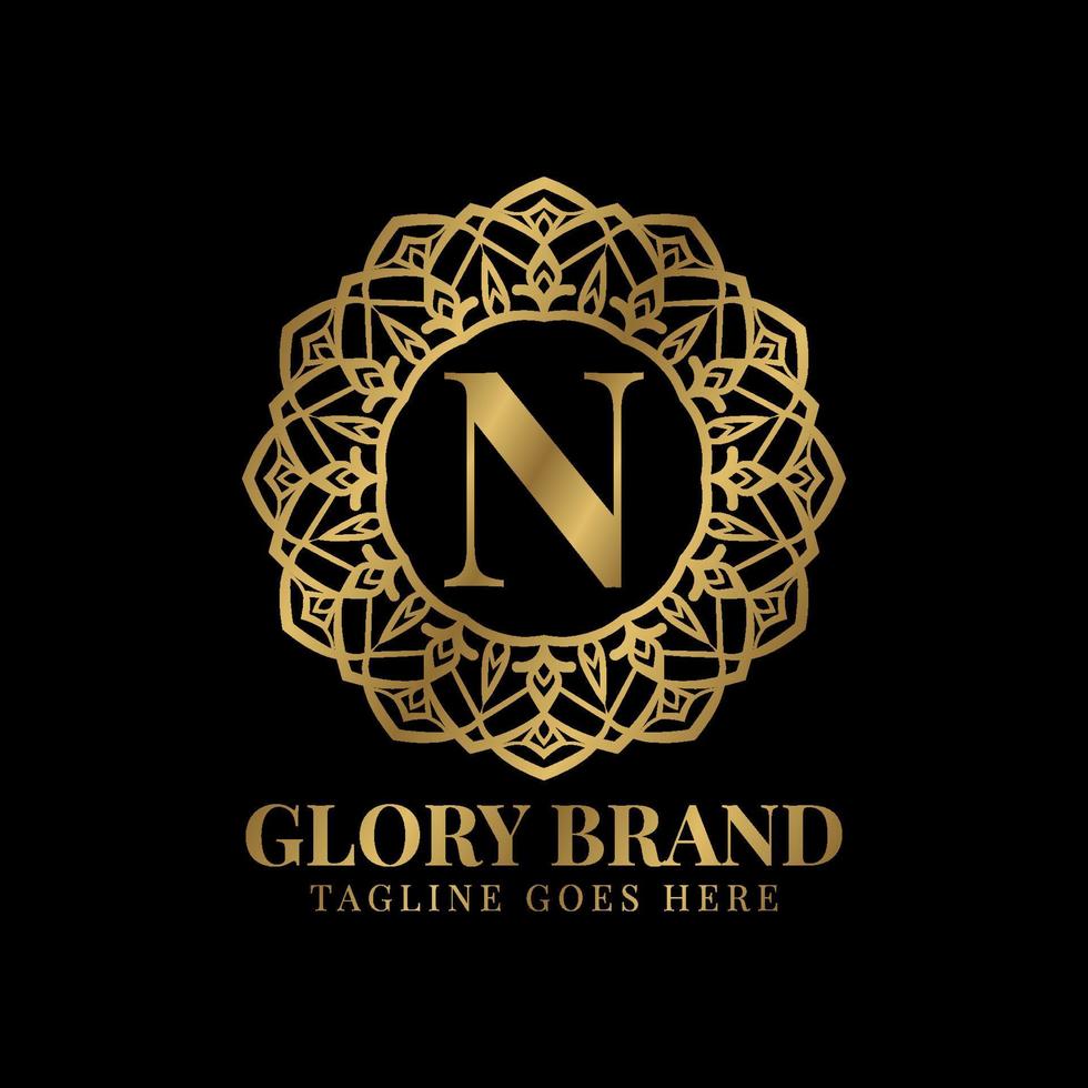 letter N glory mandala vintage golden color luxury vector logo design