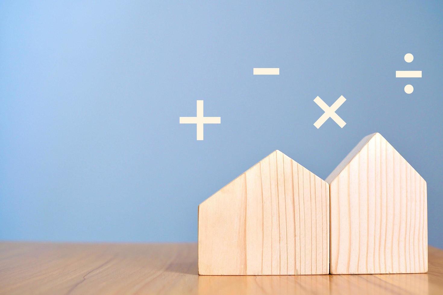 House object and wooden blocks on the table. photo