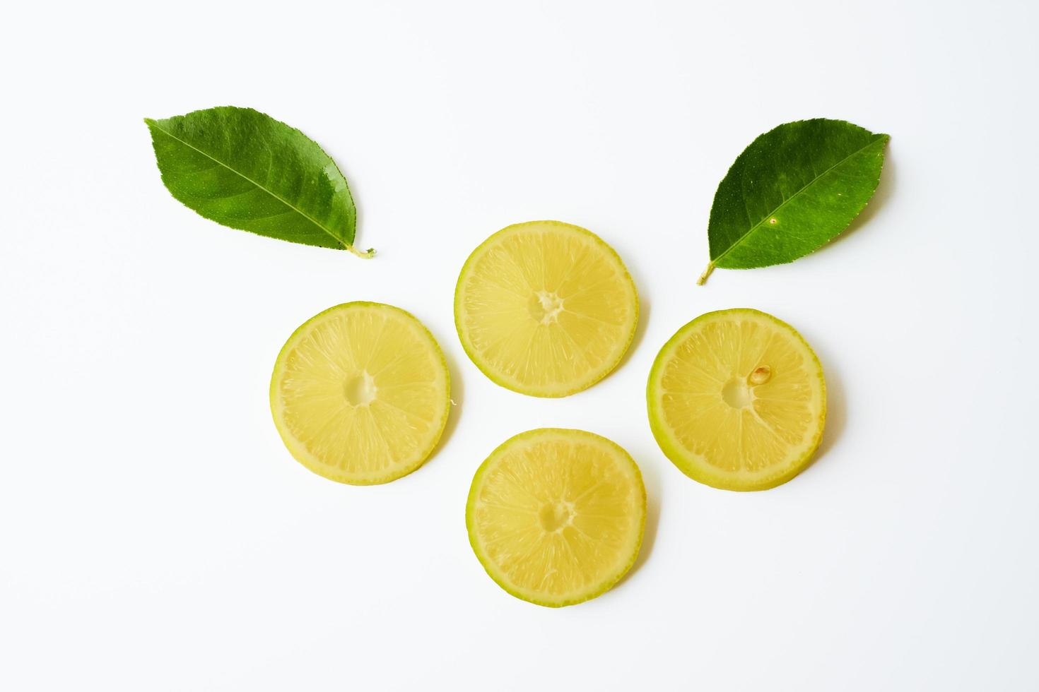 Lemon sliced isolated on white background. photo