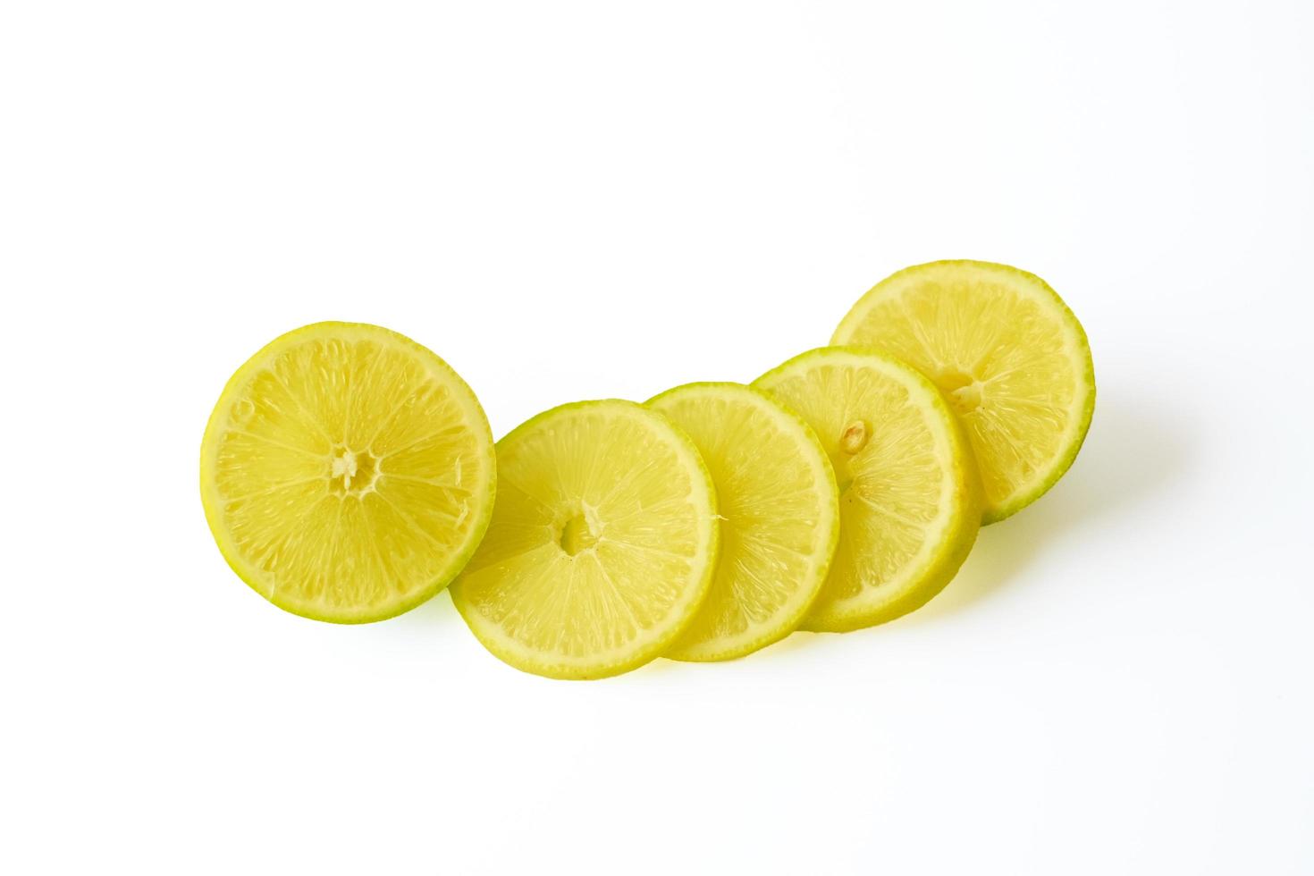 Lemon sliced isolated on white background. photo