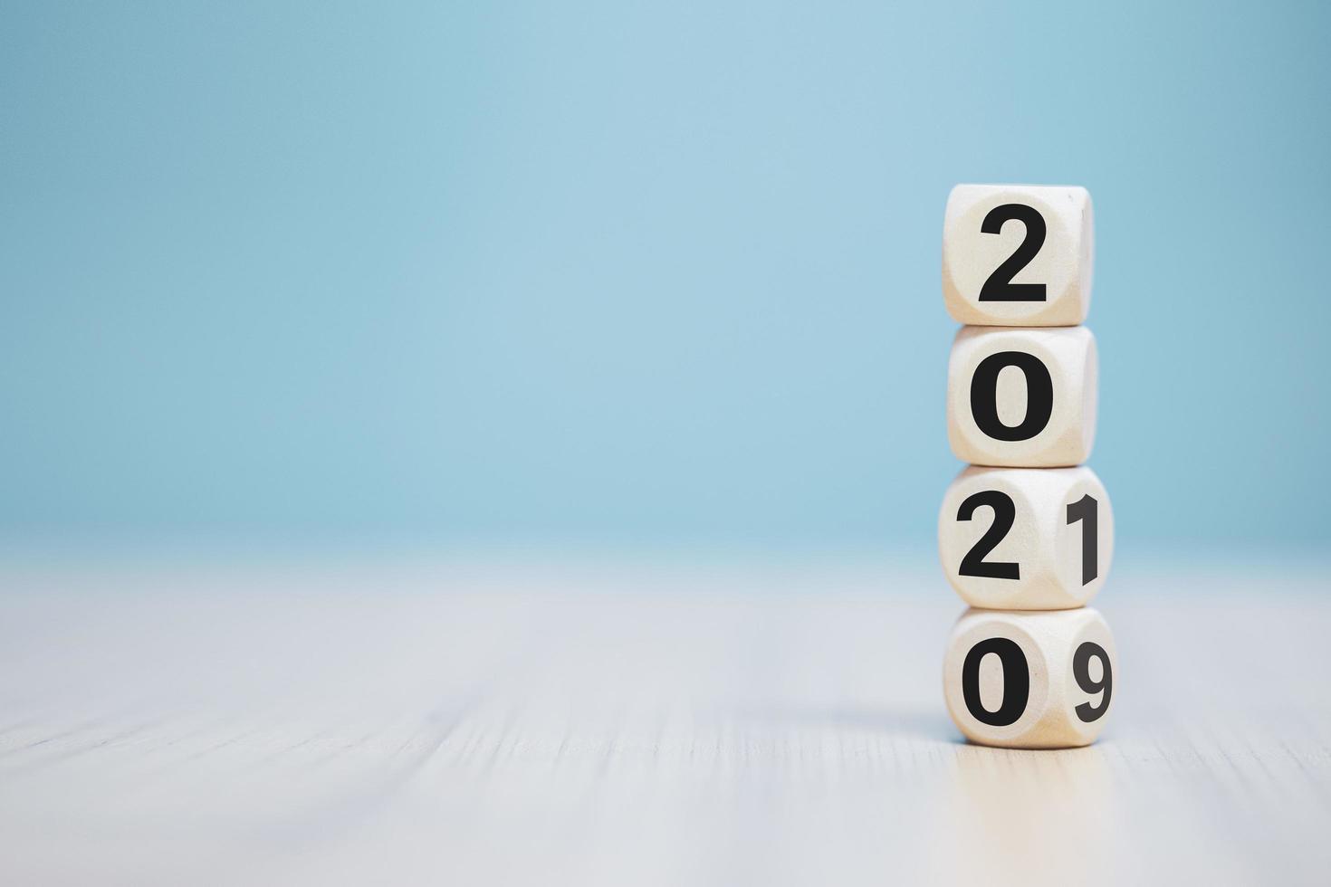 wooden cube with word 2019 change to 2020 , new year concept photo