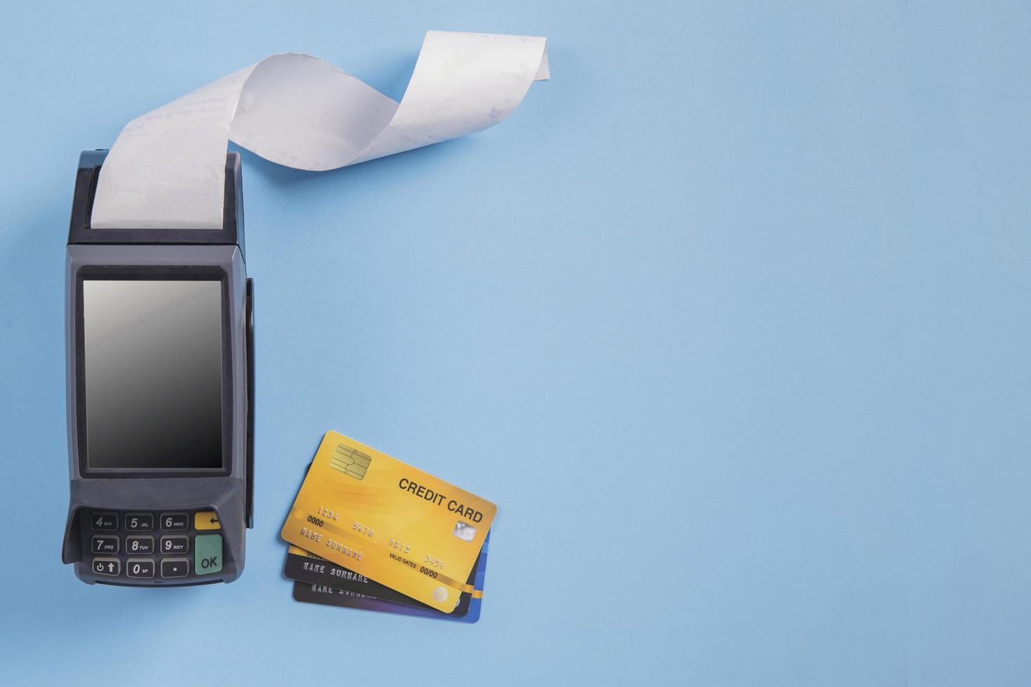 Payment terminal credit card for online shopping , machine technology connection sme service on blue background photo