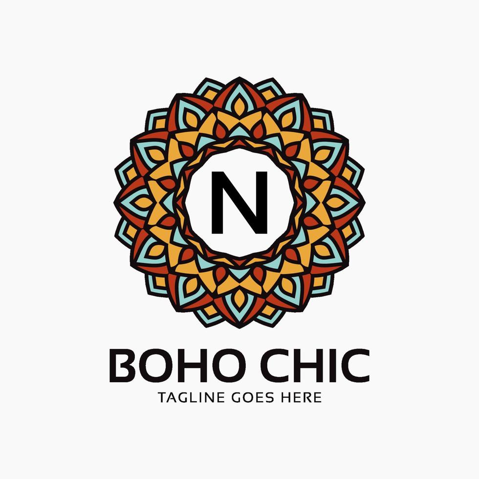 letter N boho chic round decoration vintage color mandala vector logo design element