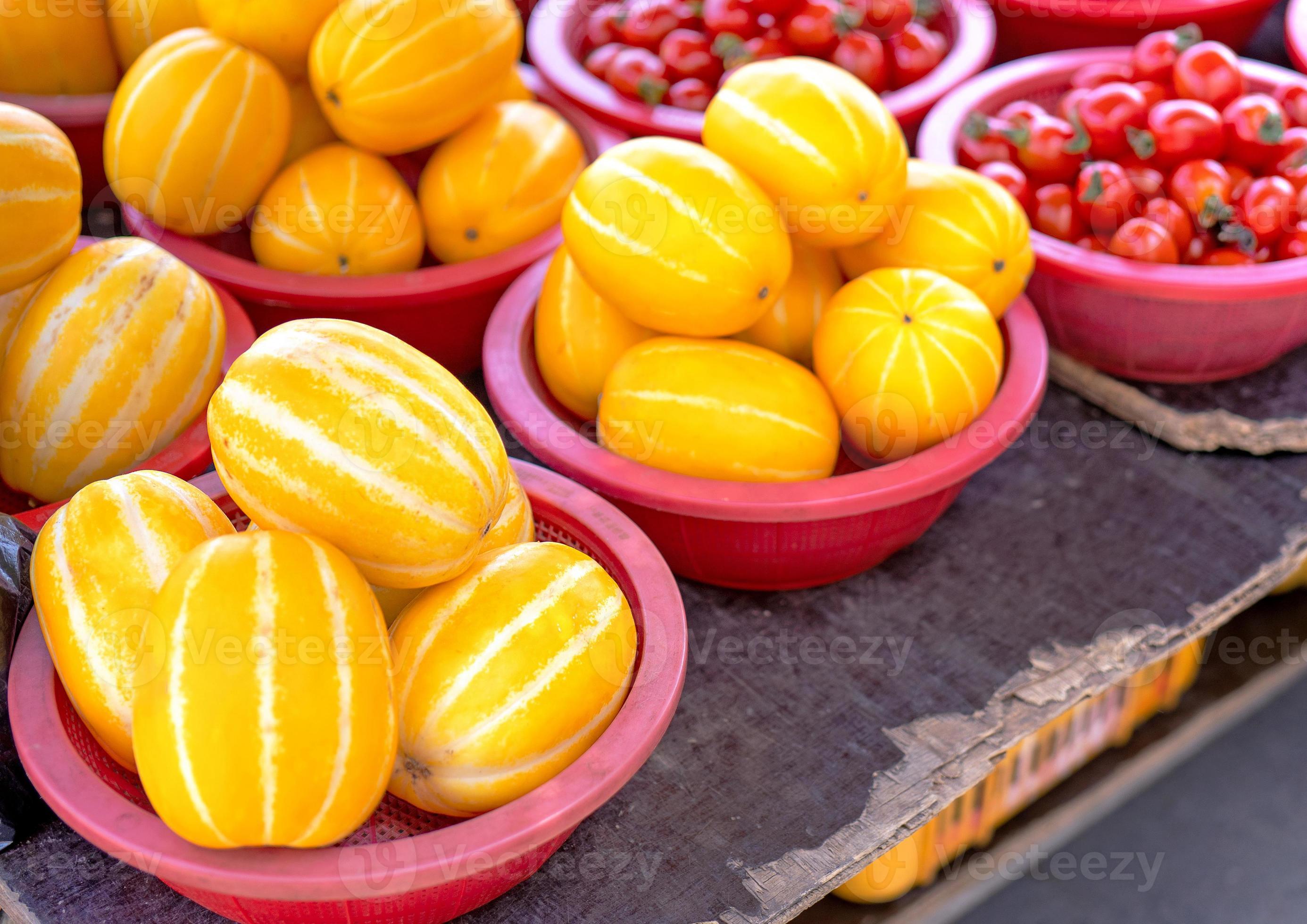 Delicious korean stripe yellow melon fruit food in red plastic basket