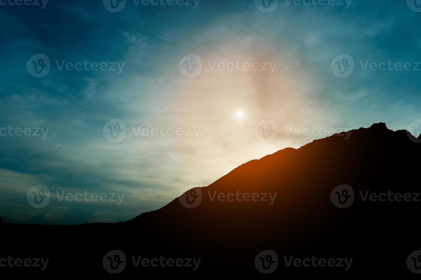 The silhouette of the mountain, team leadership, teamwork and teamwork and delight in the silhouette concept photo