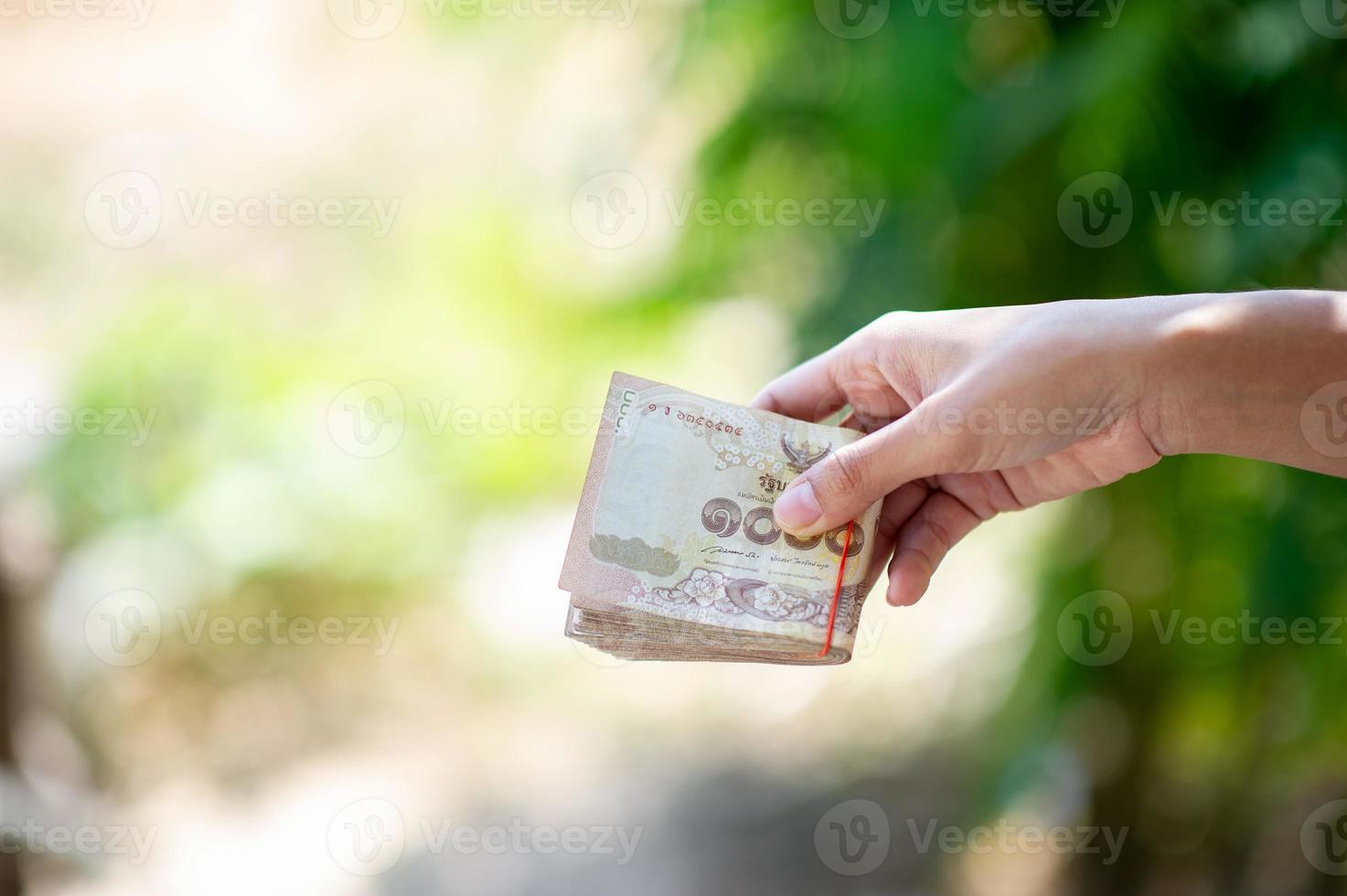 Close-up photos and bank cards used for business and currency exchange purchases. Hand and money concept