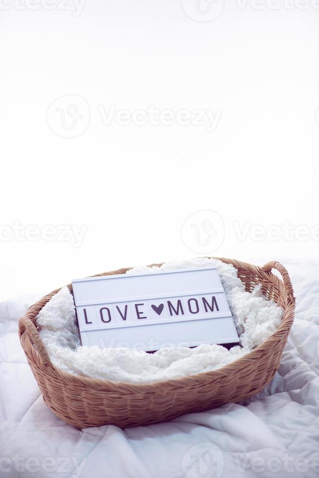 White mother's love sign instead of love for mother photo