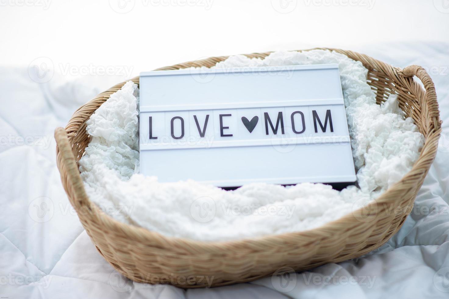 White mother's love sign instead of love for mother photo