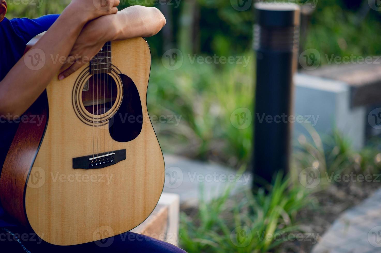 Hands and guitars of guitarists playing guitar concepts, musical instruments photo