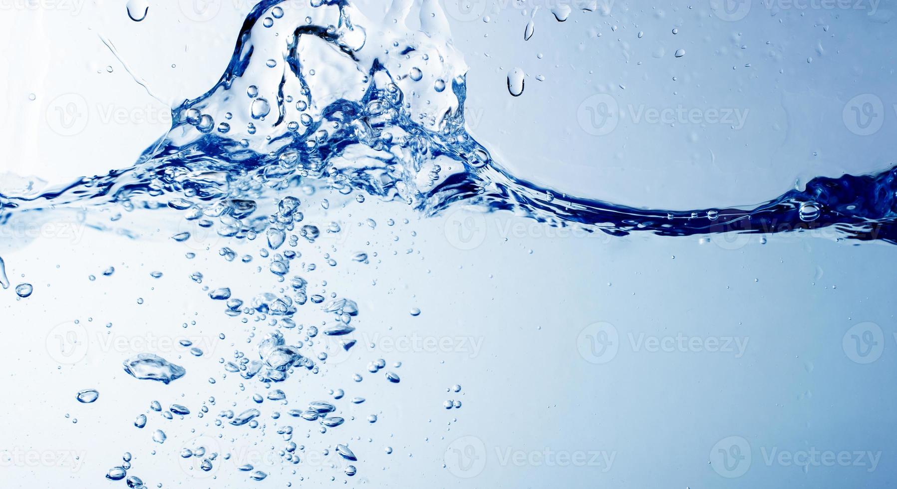 Water and bubbles on the blue water background photo