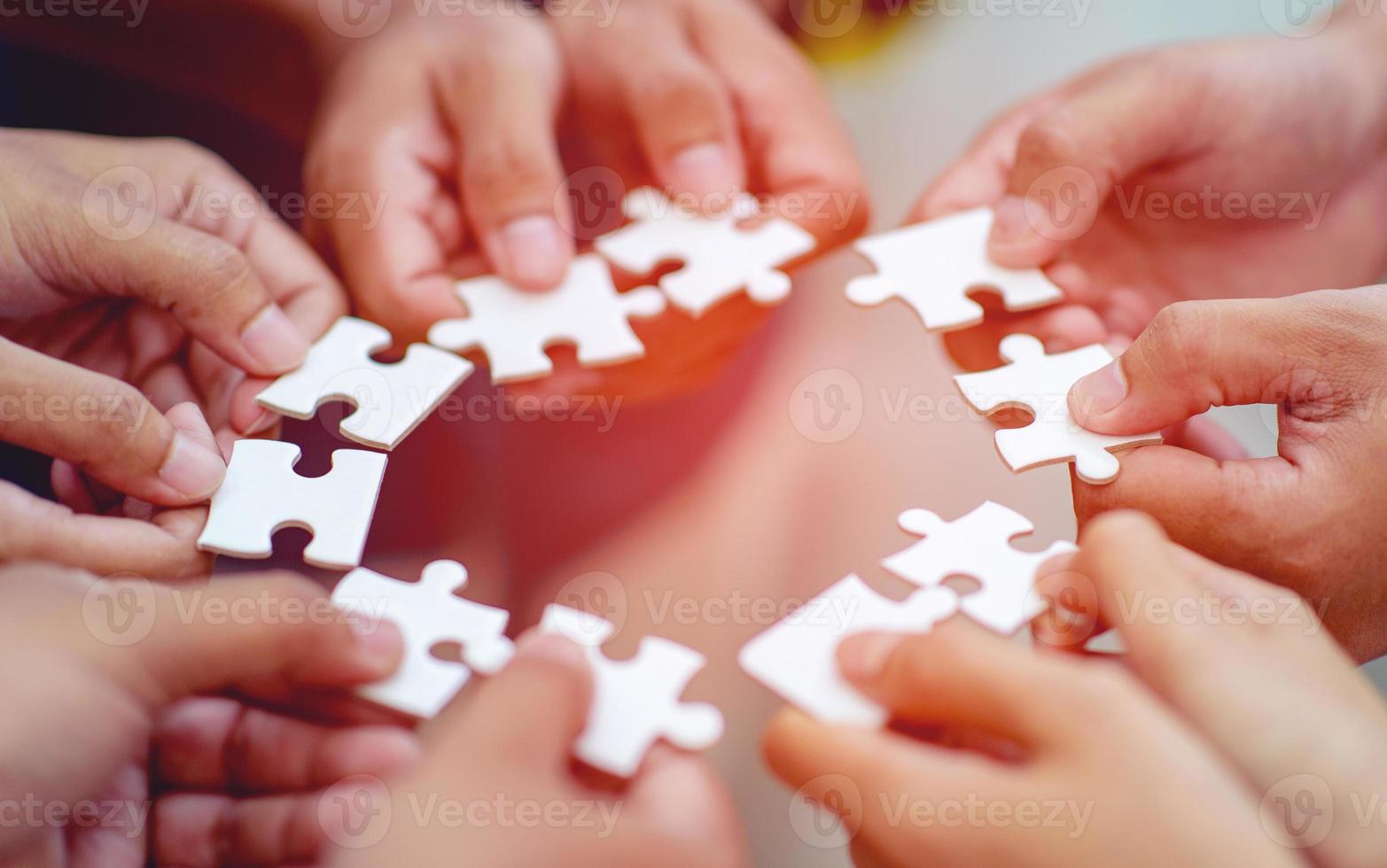 Team work, hands and jig Saw Unite with power Is a good team of successful people Team work concept photo