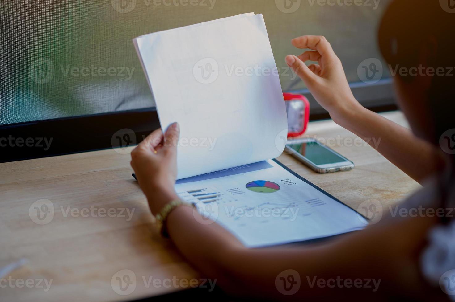 Hand and graph chart Business graph analysis of successful businessmen Business concept photo