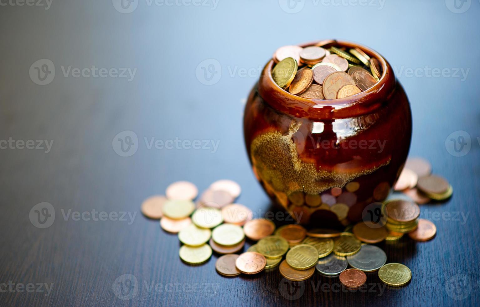 The concept of saving money predefined by saving coins for a growing business division. photo