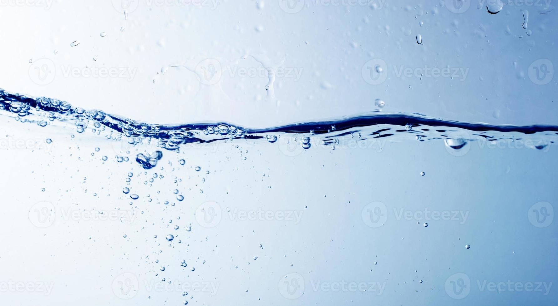 Water and bubbles on the blue water background photo