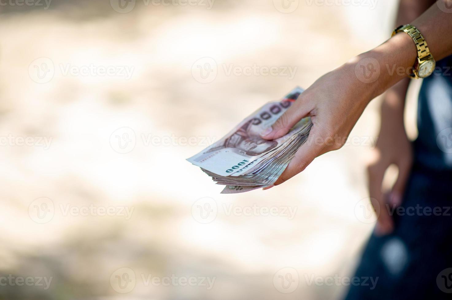 Close-up photos and bank cards used for business and currency exchange purchases. Hand and money concept