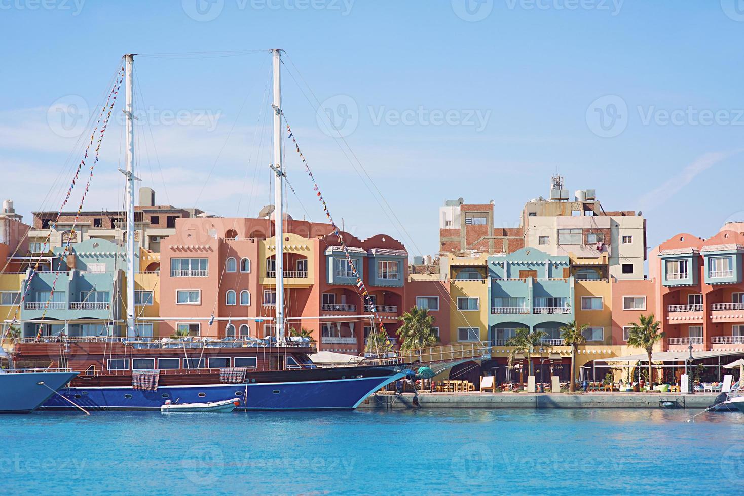 yachts and boats in the port town by the sea in summer. Travel, recreation, environment concept photo