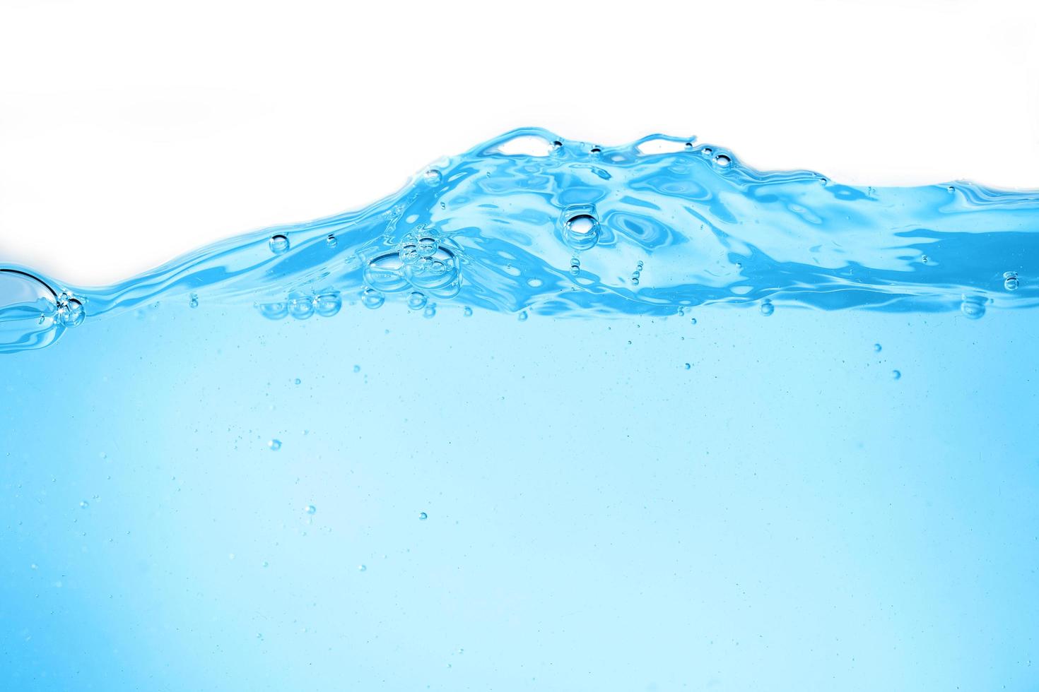 Blue surface water and air bubble isolated on white background photo