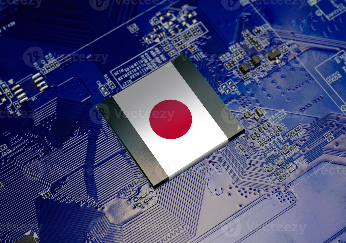 Japanese flag on CPU operating chipset computer electronic circuit board, Republic of japan technology or hardware development related conceptual photo