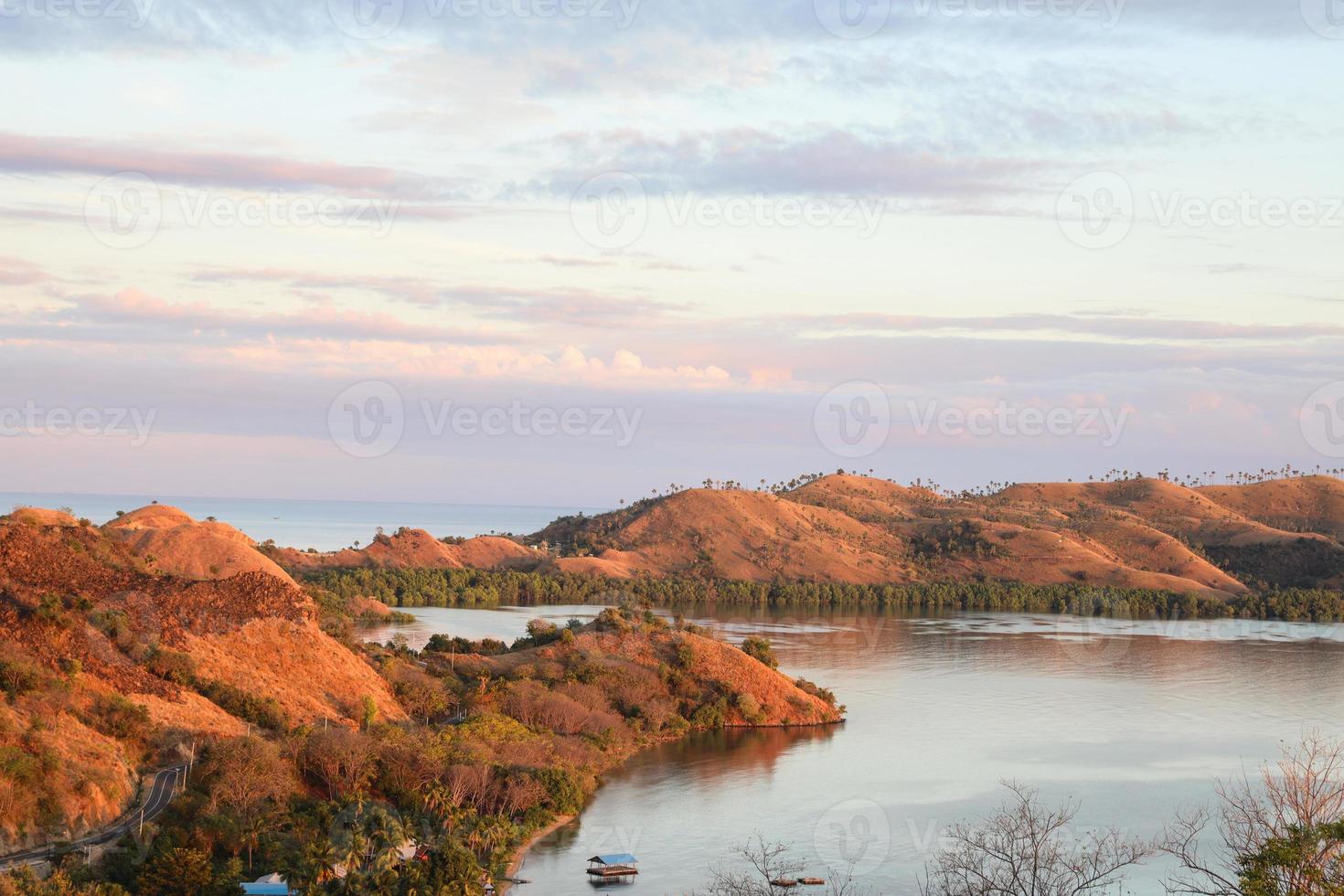 Beautiful view of hills in the ocean at Labuan Bajo Indonesia photo