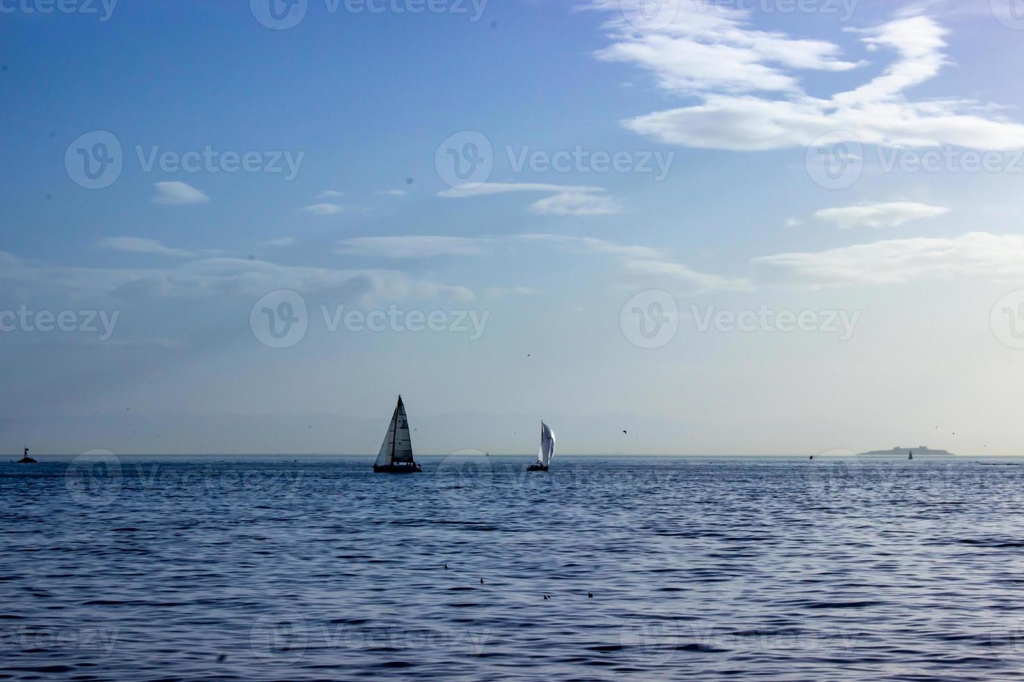 Sailboat on sea sunshine sky photo