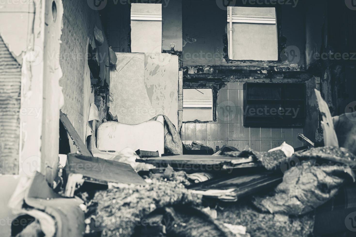 Houses and fields in ruins, demolished, abandoned and junkyard photo